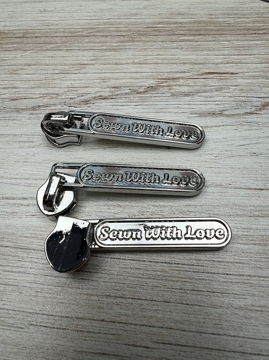 Individual #5 Zipper Pulls